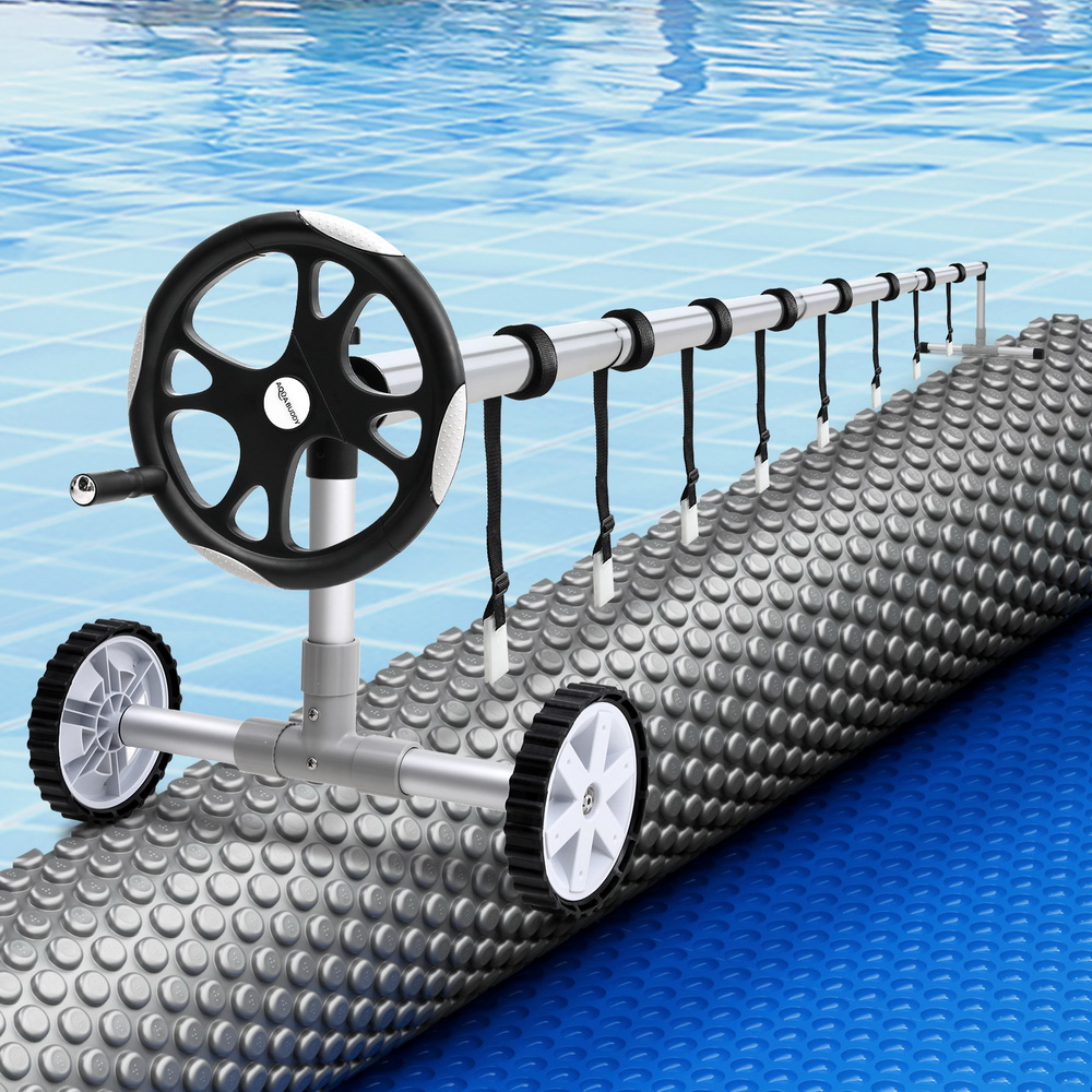 PC-110X62-L-DX-BL-64ROL-191835-04 Aqua Buddy Pool Cover 600 Micron 11x6.2m w/ Roller 6.55m Swimming Pools Solar Blanket - Image 1