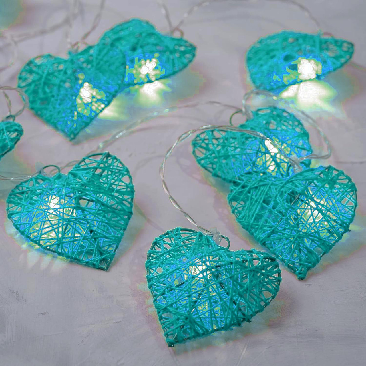 V382-TURQHRTRATTBATT50-202504291100-00 50 Turquoise Blue 3D Hollowed Rattan Heart-Shaped 5M LONG String Fairy Lights, Battery (AA) Indoor & Outdoor Decorations Birthday Kids Celebration PartyRoom Table Lighting - Image 1