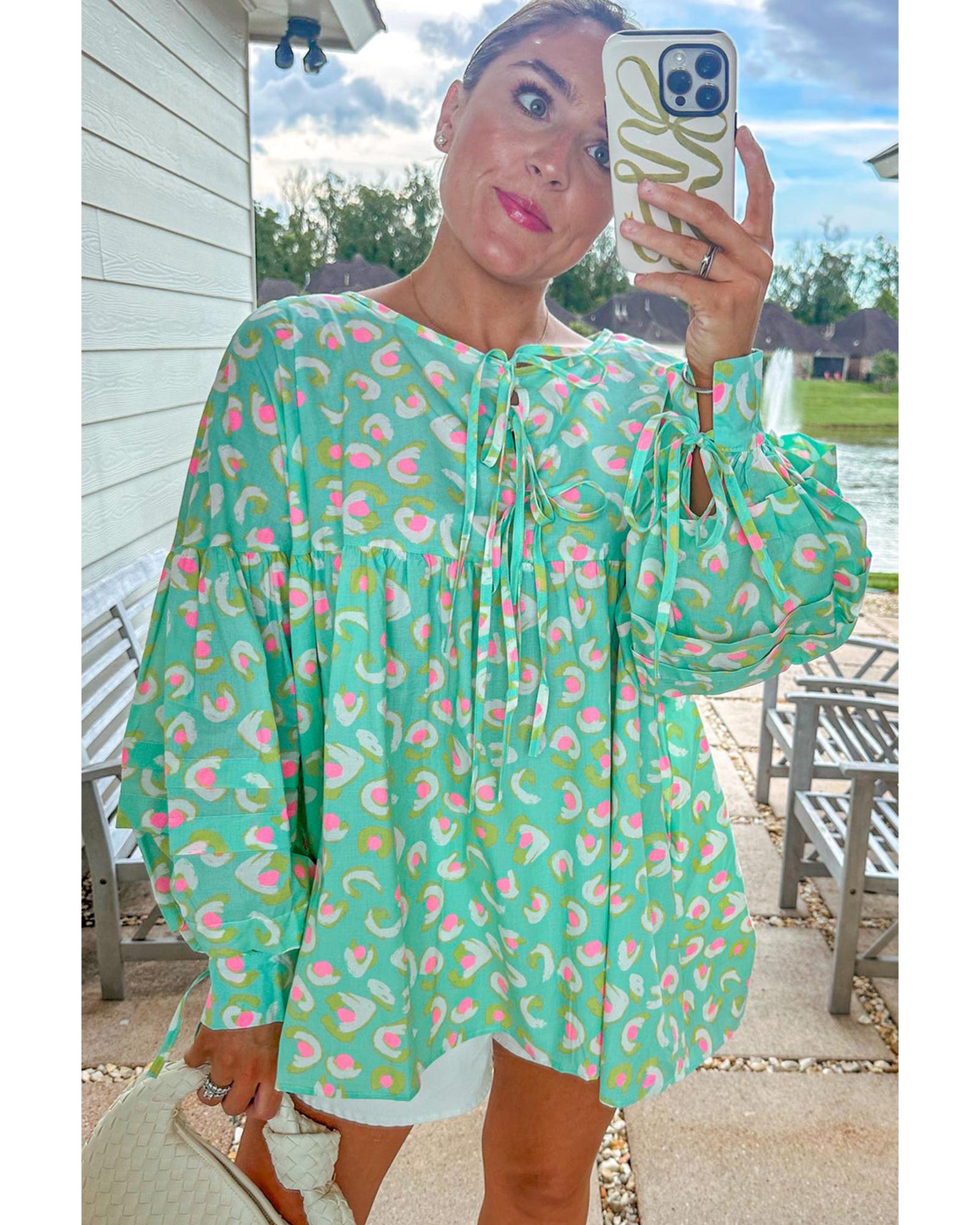 V539-AZEXDC25128894-P920-L-202508270335-00 Green Abstract Printed Lace-up Lantern Sleeve Babydoll Blouse - L - Image 1