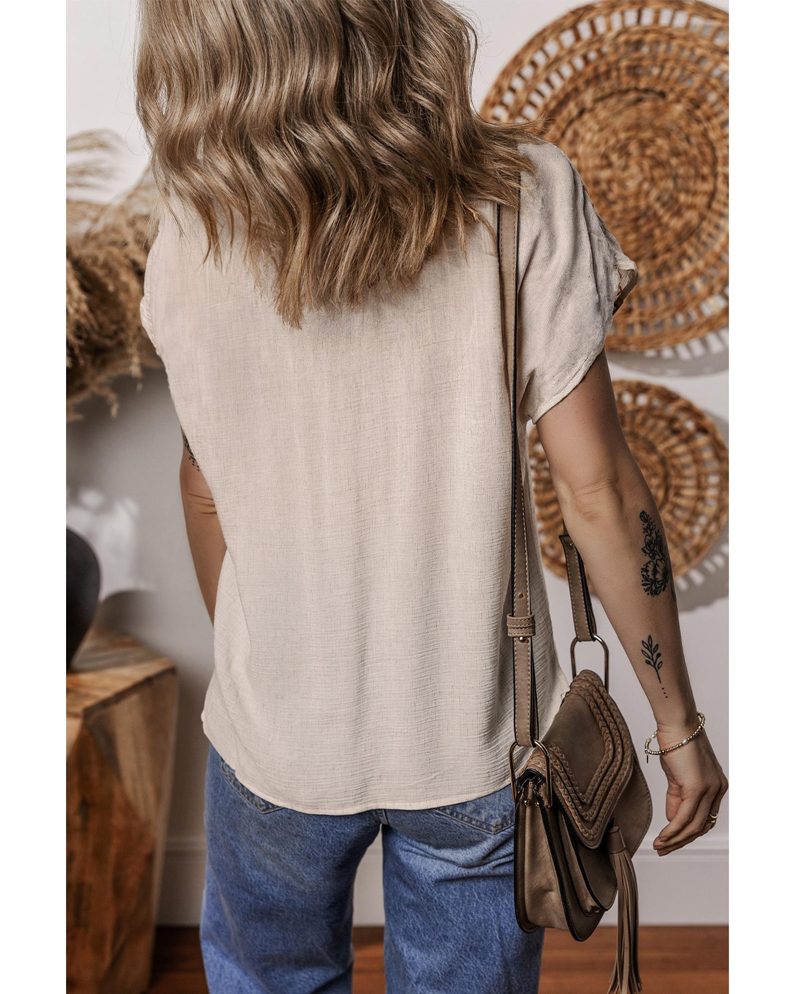 V539-AZEXDC25129717-P2015-L-202508272030-00 Jet Stream Geometric Embroidered Short Sleeve Tassel Tied V Neck Blouse - L - Image 1