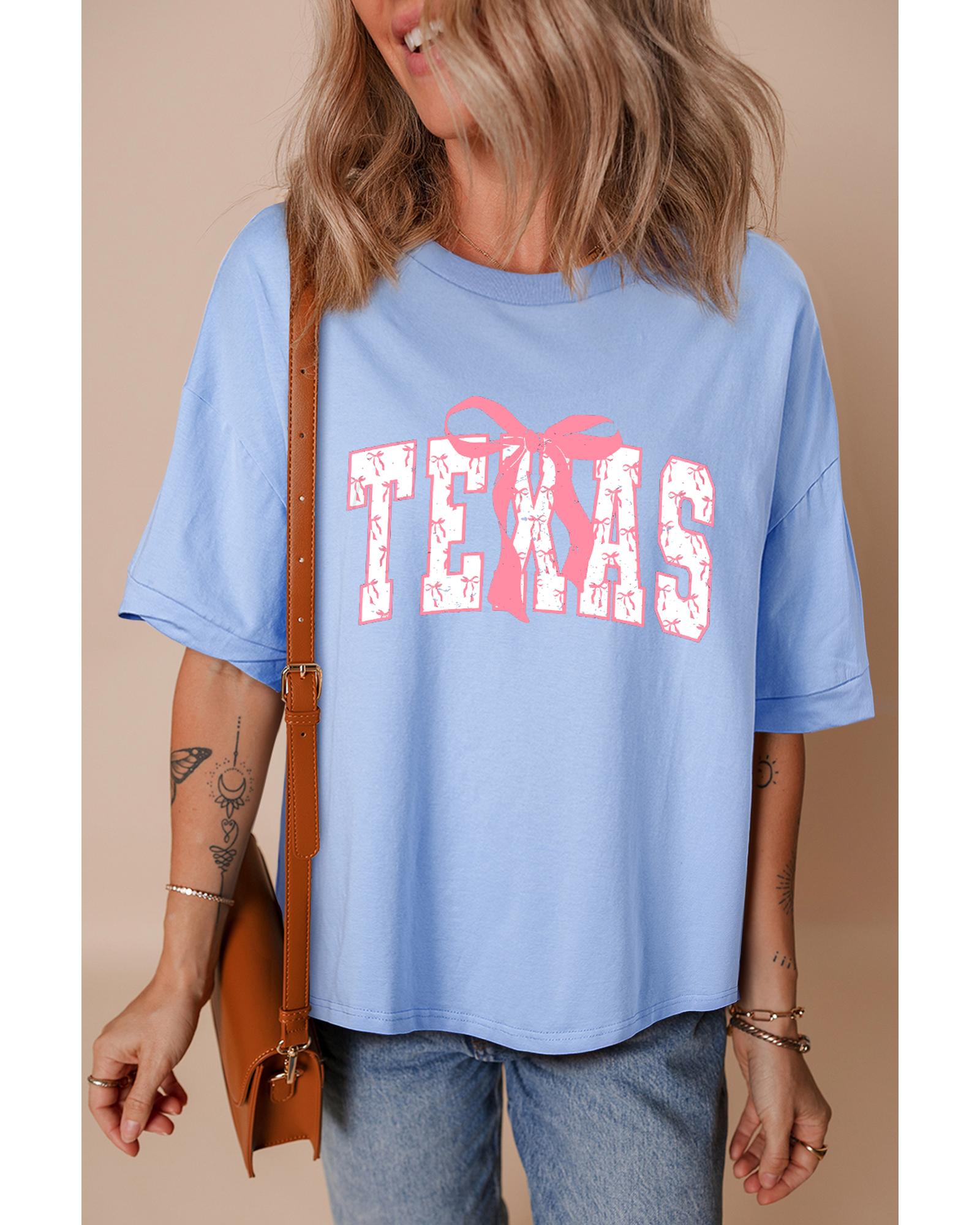 V539-AZEXDC25229008-P1204-XL-202508280935-00 Myosotis TEXAS Bow Graphic Half Sleeve Drop Shoulder Loose Tee - XL - Image 1