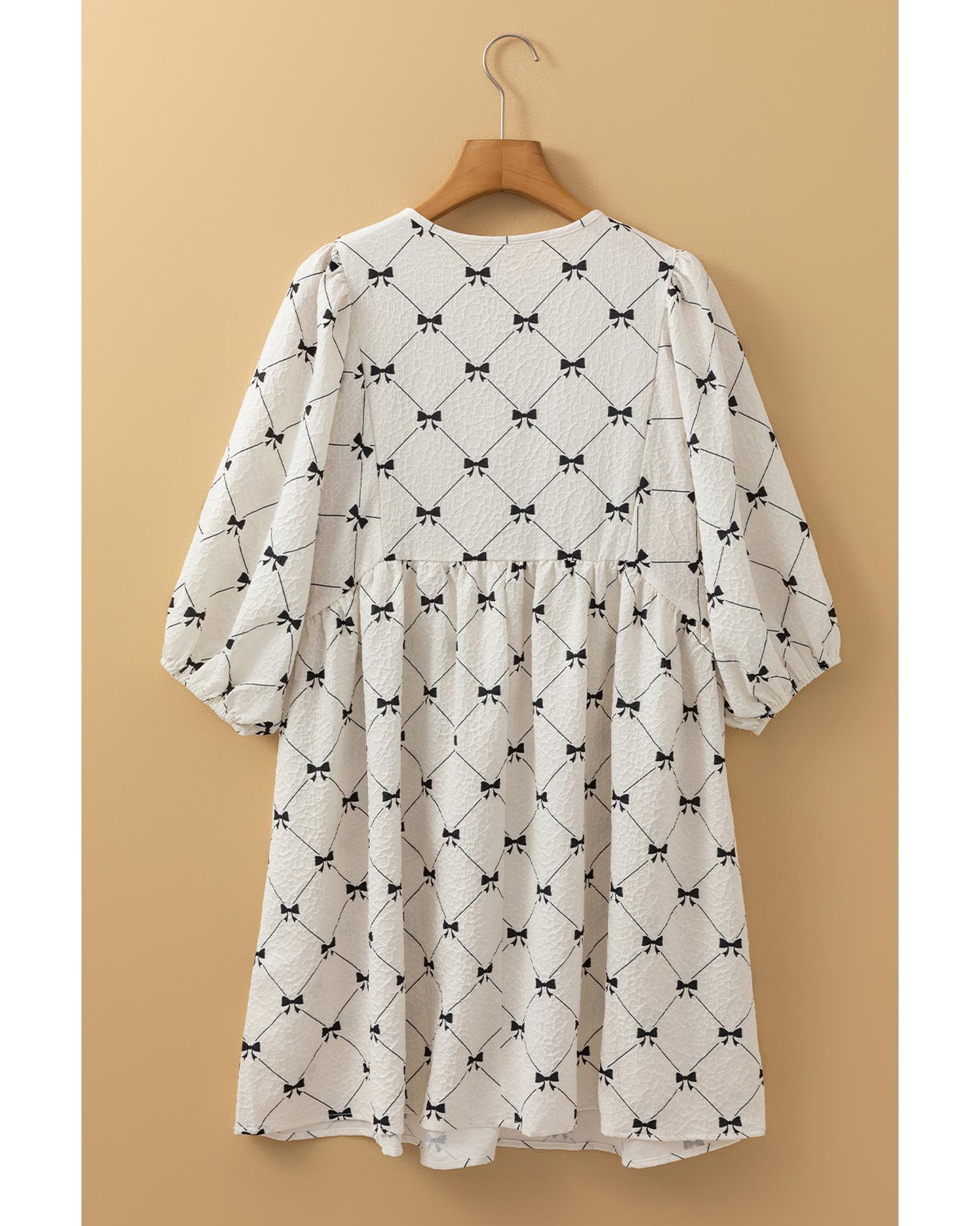 V539-AZEXDC6122762-P120-XL-202508311515-00 White Bowtie Pattern Textured Puff Half Sleeve Loose Mini Dress - XL - Image 1