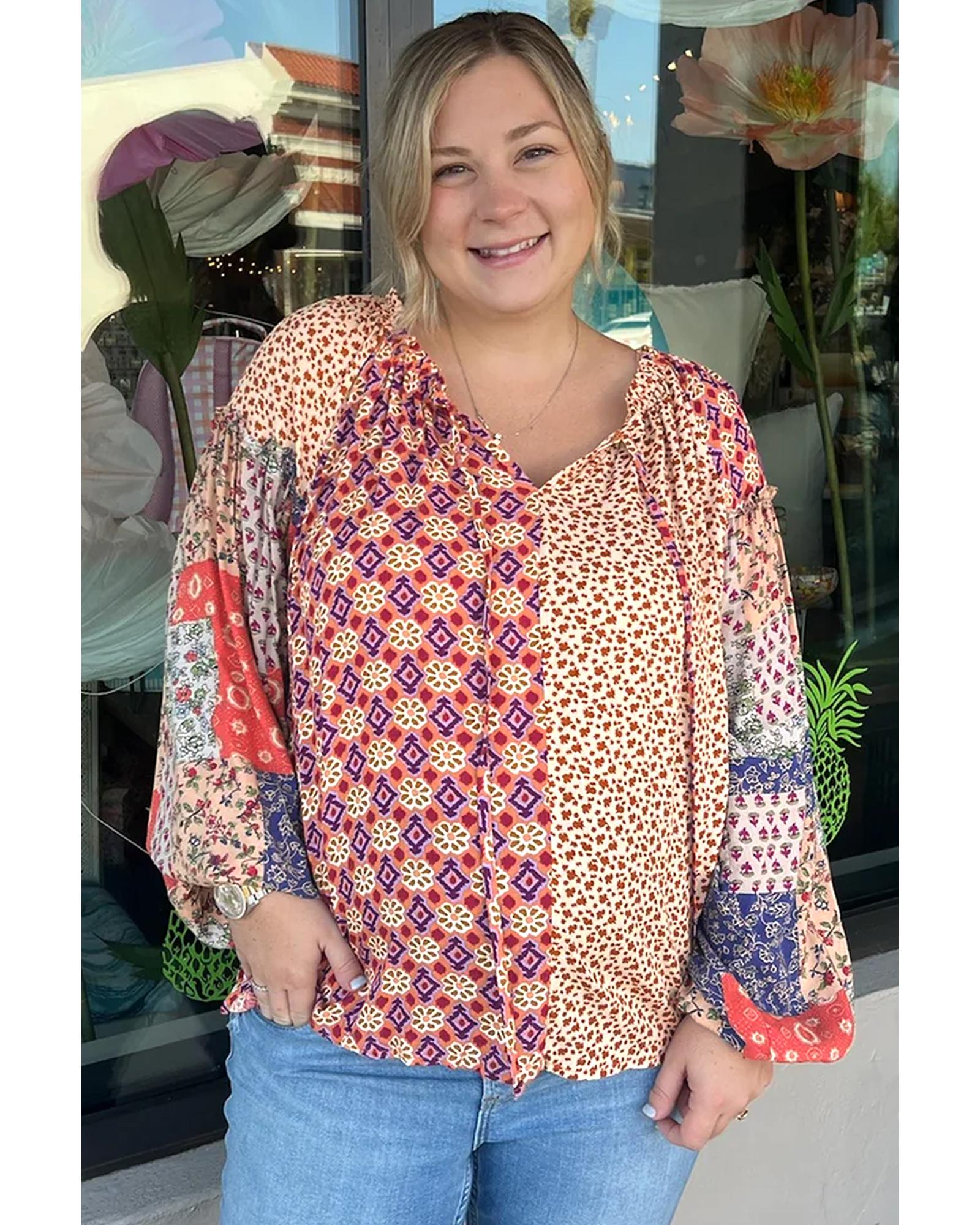 V539-AZEXPL2512636-P1422-1X-202506182152-00 Orange Floral Geometric Patchwork Lace-up Crewneck Plus Size Blouse - 1X - Image 1