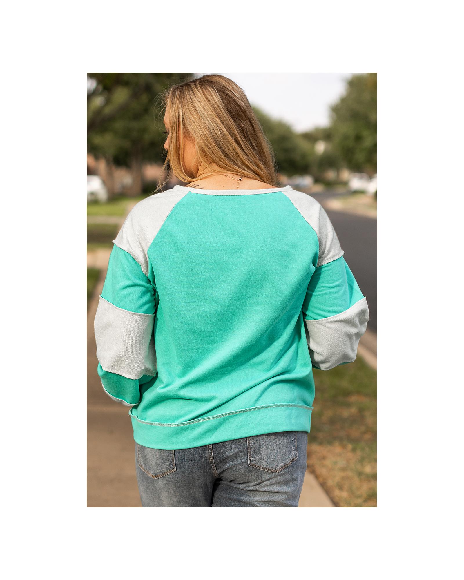 V539-AZEXPL253604-P504-2X-202508301010-00 Aruba Blue Colorblock Patchwork Cross Seam Plus Sweatshirt - 2X - Image 1