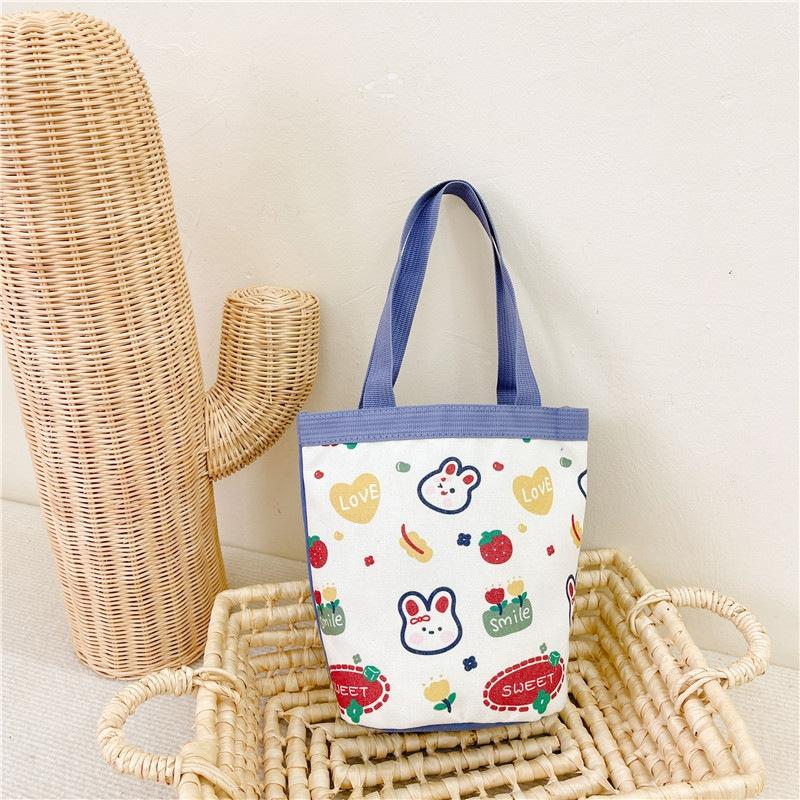 V562-3051124060DBT-202503041320-00 Cartoon Graffiti Bento Bag - Cute Canvas Handbag - Model 1 Blue - Image 1