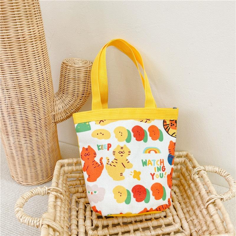 V562-6051124060DBT-202503041320-00 Cartoon Graffiti Bento Bag - Cute Canvas Handbag - Model 2 Yellow - Image 1