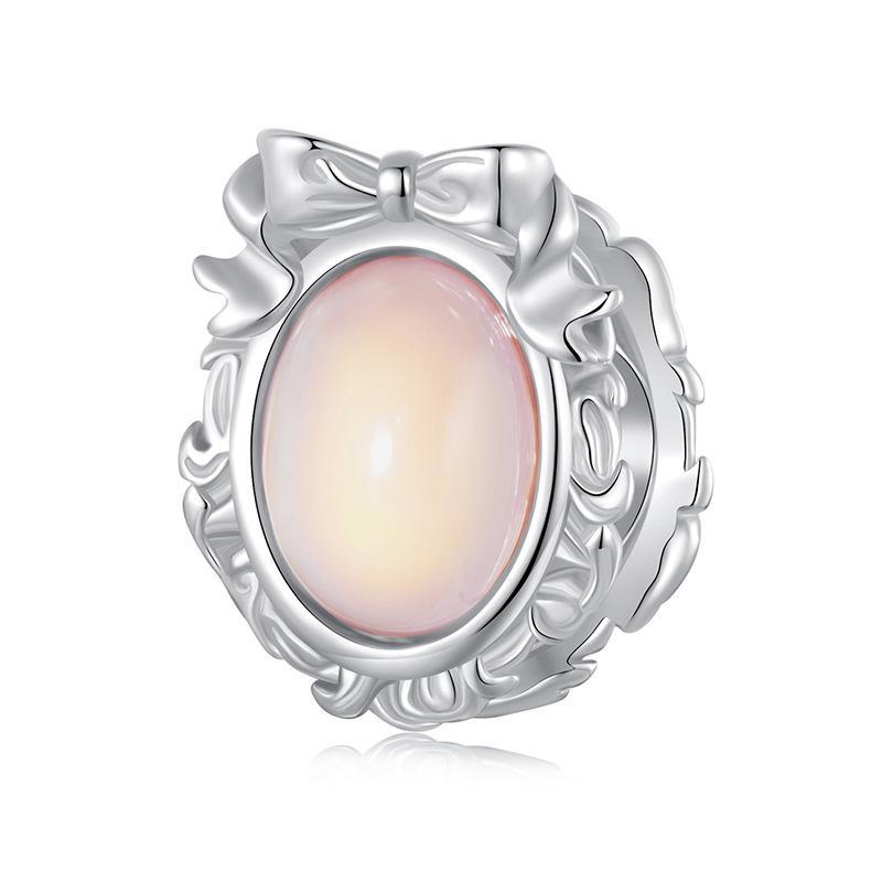 V562-A1072965060DBT-202504112032-00 925 Sterling Silver Platinum Plated Starlight Bow Beads - Image 1