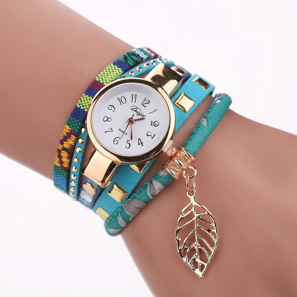 V562-F1053857550DBT-202505271122-00 Leaf Pendant Quartz Bracelet Watch for Women - Sky Blue - Image 1