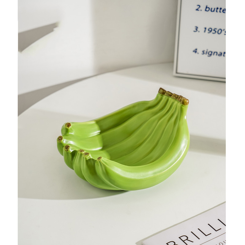 V888-ELOSUNG12944-213960-00 Green Ceramic Banana-Shaped Fruit Plate - Decorative and Functional Storage Tray - Image 1