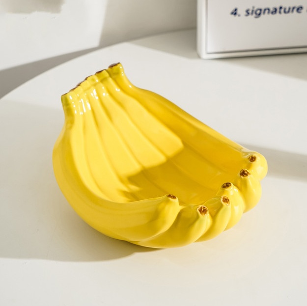V888-ELOSUNG12945-213959-00 Yellow Ceramic Banana-Shaped Fruit Plate - Decorative and Functional Storage Tray - Image 1