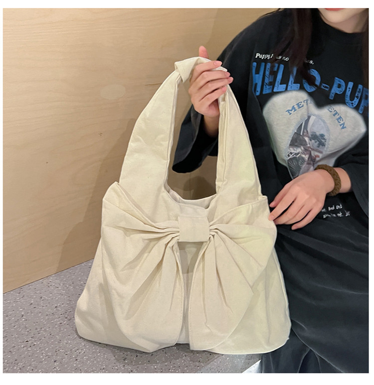 V888-ELOSUNG13287-211076-00 White Women's Bowknot Shoulder Bag - New Sweet Style, Large Capacity Canvas Tote Bag, Commuter Single Shoulder Handbag - Image 1