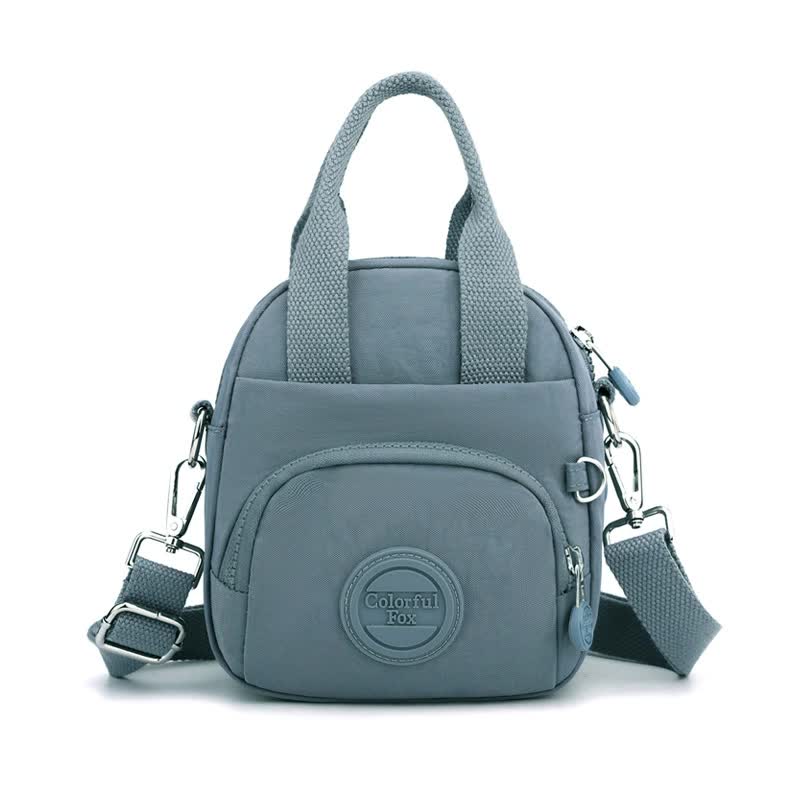 V888-ELOSUNG15537-214202-00 Deep Teal Mini Waterproof Nylon Backpack - Lightweight Casual Crossbody Bag - Image 1