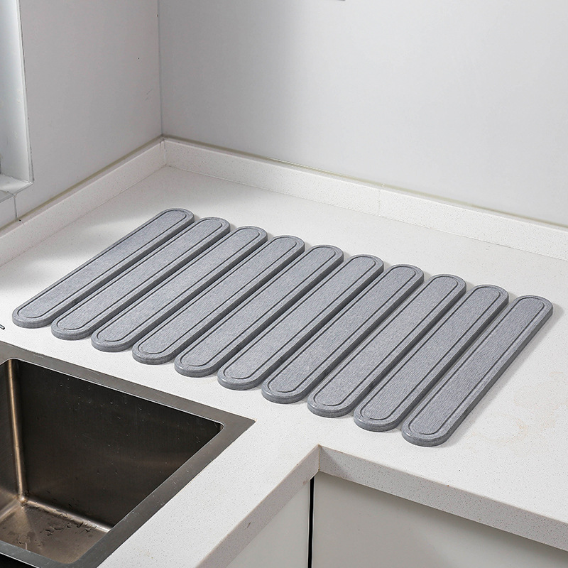 V888-ELOSUNG17212-214920-00 Light Gray Oval Shaped Engraved Inner Frame Foldable Diatomaceous Earth Drying Mat - Super Absorbent, Fast-Drying, Non-Slip Kitchen Countertop Mat - Image 1