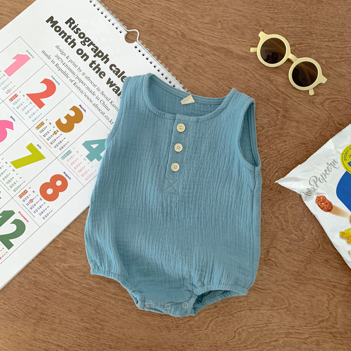 V888-ELOSUNG19857-202503181040-00 100cm Blue Sleeveless Bubble Cotton Baby Romper - Soft Newborn Onesie for Boys and Girls, 0-2 Years - Image 1