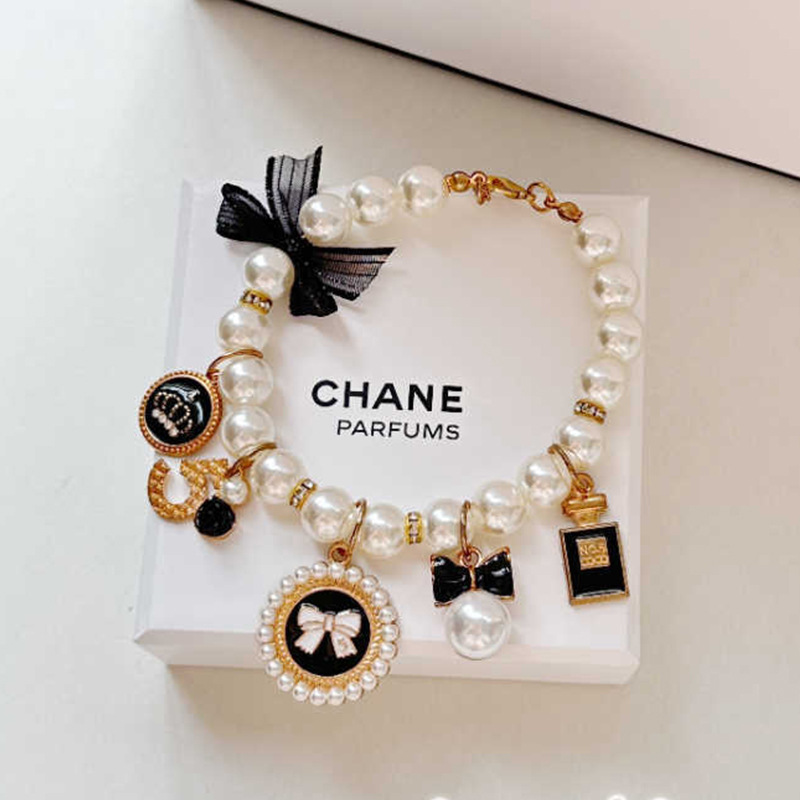 V888-ELOSUNG22522-202503272030-00 Black 4-PCS Pearl Charm Pet Necklace - Adjustable Bowknot Collar for Small Dogs & Cats (M: 25+5CM) - Image 1