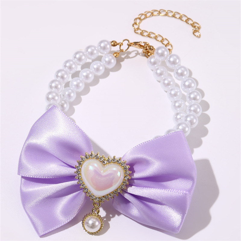 V888-ELOSUNG22845-202504141353-00 2 - PCS Cute Pet Pearl Necklace Collar with Purple Bow and Heart Charm - Size L - Image 1