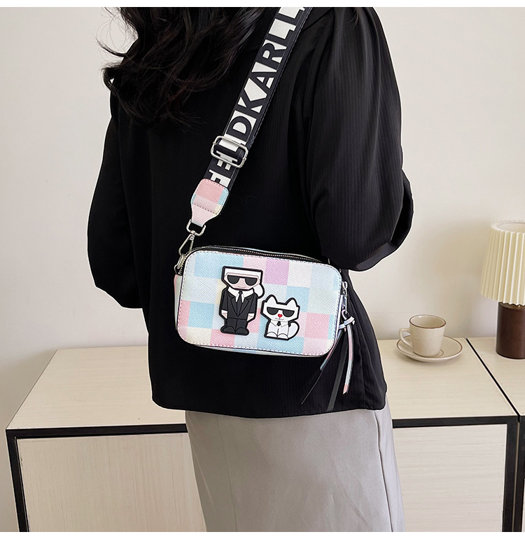 V888-ELOSUNG26774-202505131931-00 Pink plaid Unique Doodle Print PU Leather Bag - Lightweight Crossbody with Character - Image 1