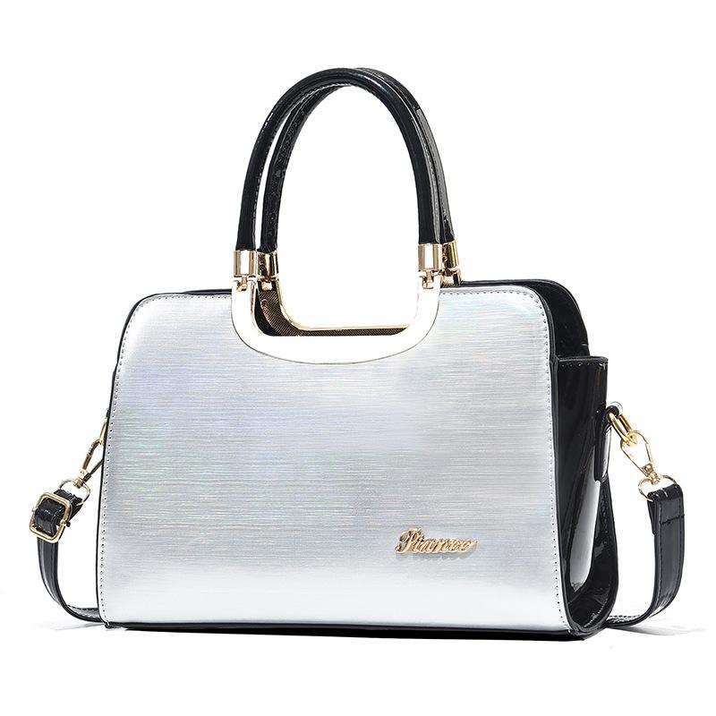 V562-G1051232060DBT-202508281726-00 Large Capacity Leather Commuter Handbag - Bright - Silver - Image 1